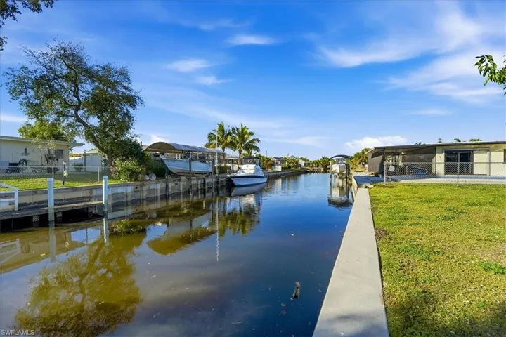 Dock featuring a water view