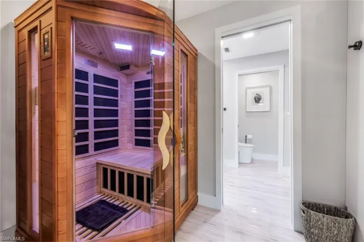 View of sauna / steam room featuring wooden ceiling