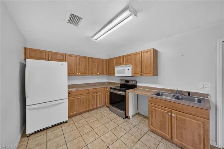 1133/1135 Gordon Ave S, Lehigh Acres, Florida 33973