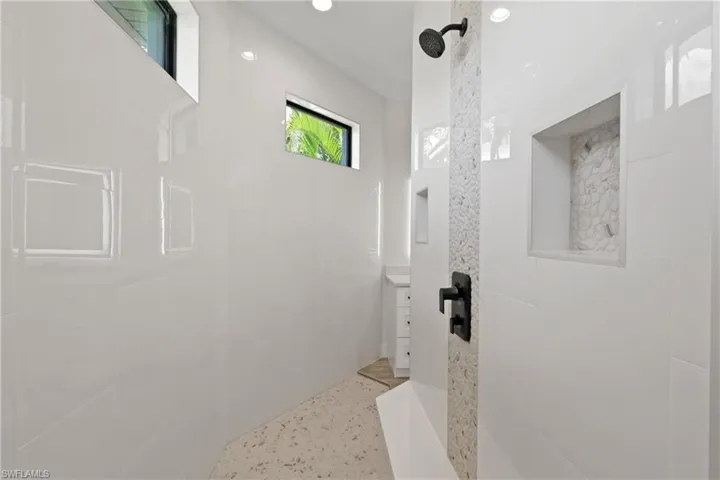 Master Bathroom featuring tiled shower