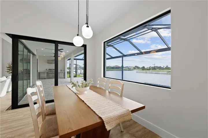 Dining space featuring a water view