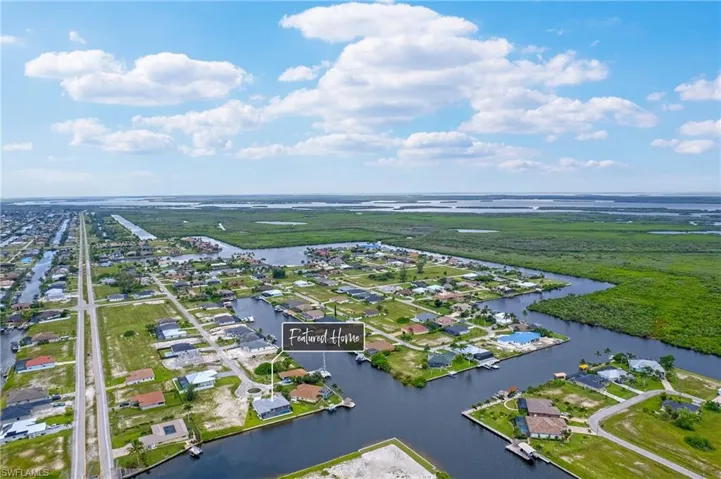 Aerial view with a water view and direct gulf access