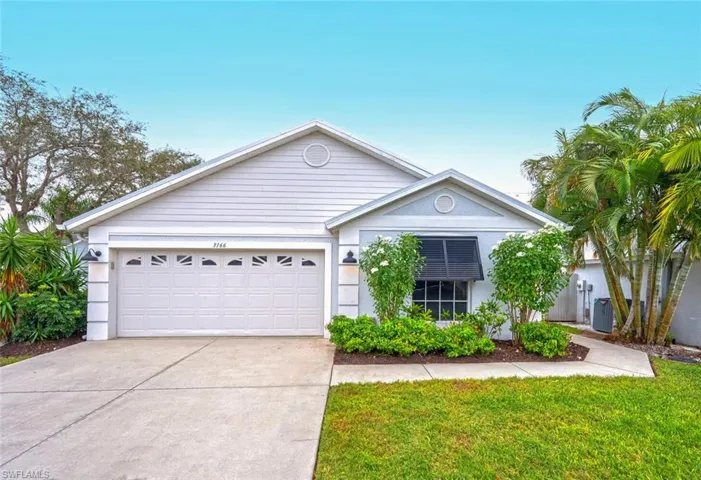 3166 Carriage Circle, front view, house runs deep, 2 car garage.