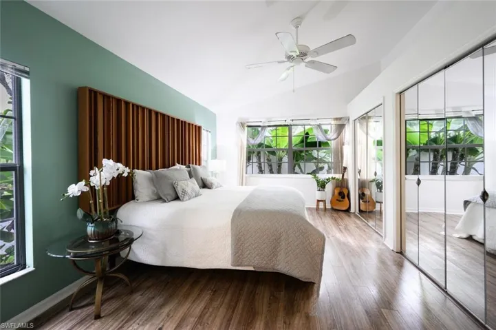 Primary, Large fits King Size Bed, Tropical Banana plants in surrounding windows, E and S view.
