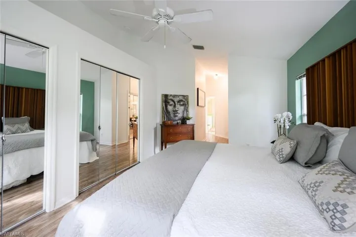 Walk In closet and full length wall closet.  King size bed, 2 nightstands, and 2 dressers