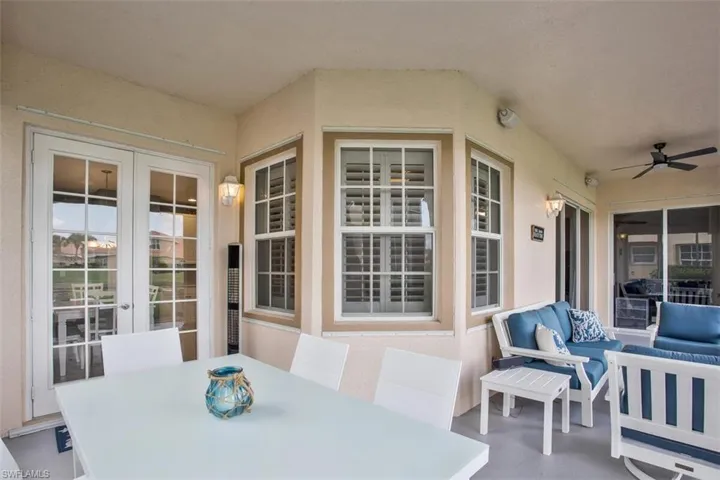 View of patio with ceiling fan, an outdoor hangout area, and french doors