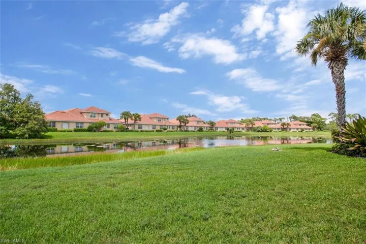 View of yard with a water view