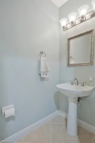 Bathroom with tile patterned flooring