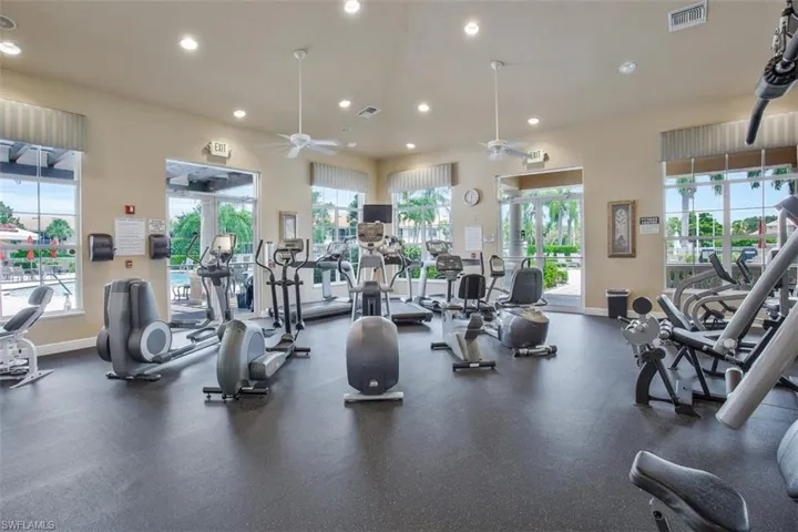 Workout area featuring ceiling fan