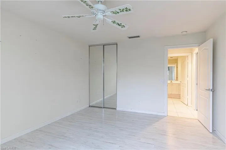 Walk-In Closet with Built-In Shelves