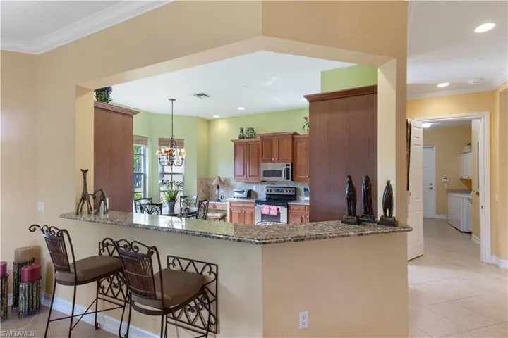 5050  Blauvelt  WAY, Naples, FL 34105