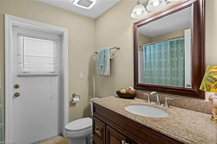 Guest bath also serves as pool bath