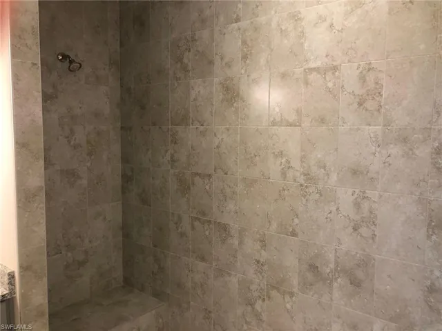 Giant two person shower.  Two shower heads.