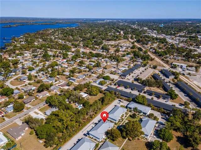 Aerial view of residential area with a large body of water