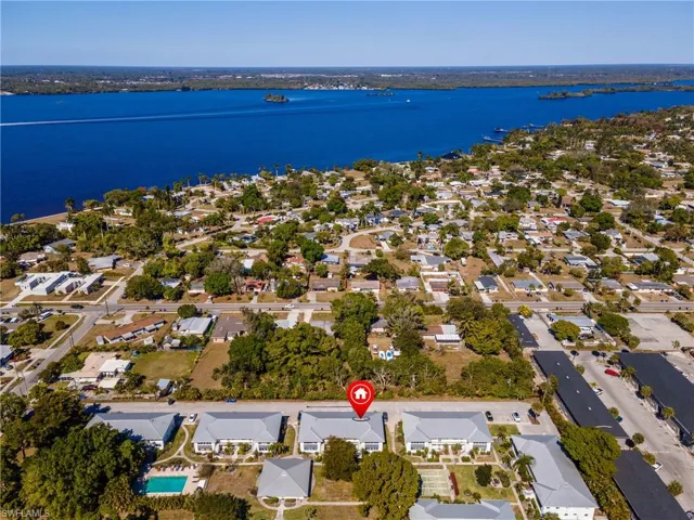 Aerial view of residential area with a nearby body of water