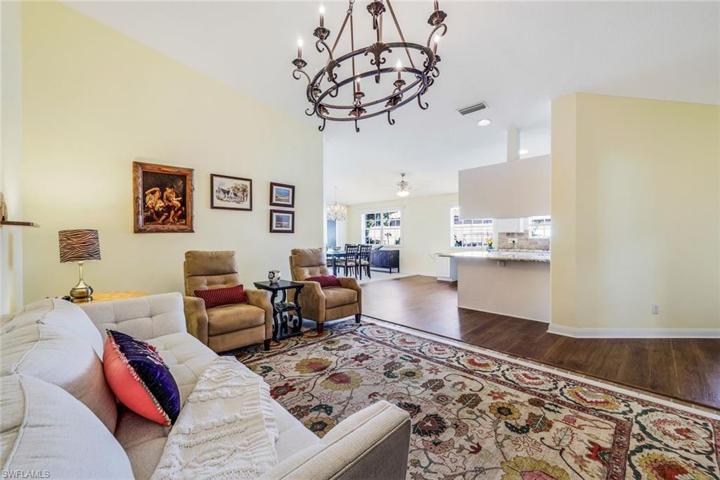 Family room with chandelier.