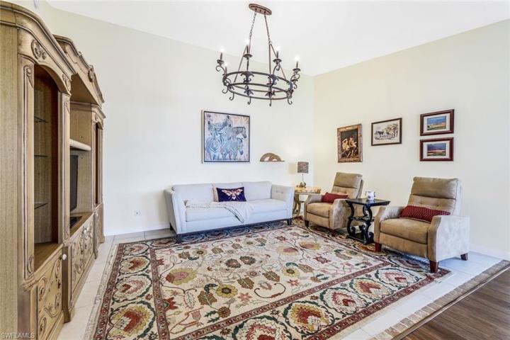 Family room with tile flooring.