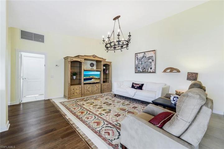 Family room with tile flooring.