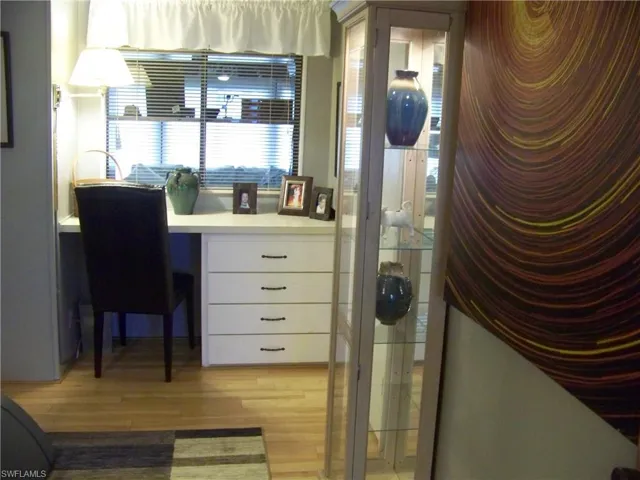 Guest bedroom with built-in desk/window