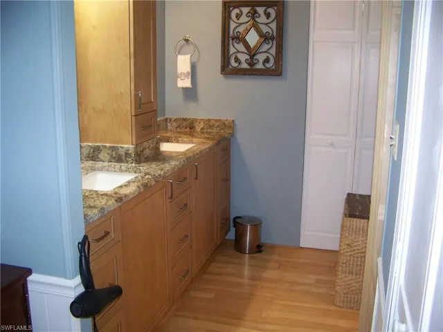 Master bathroom, dual granite undermount sinks and a large storage laundry closet!