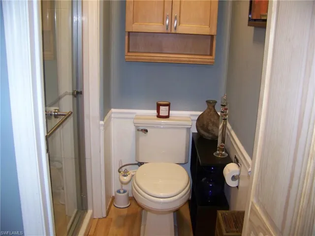 Master bath separate room with commode and nice shower