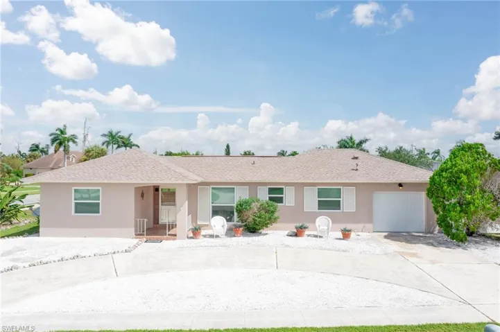 Single story home with a garage
