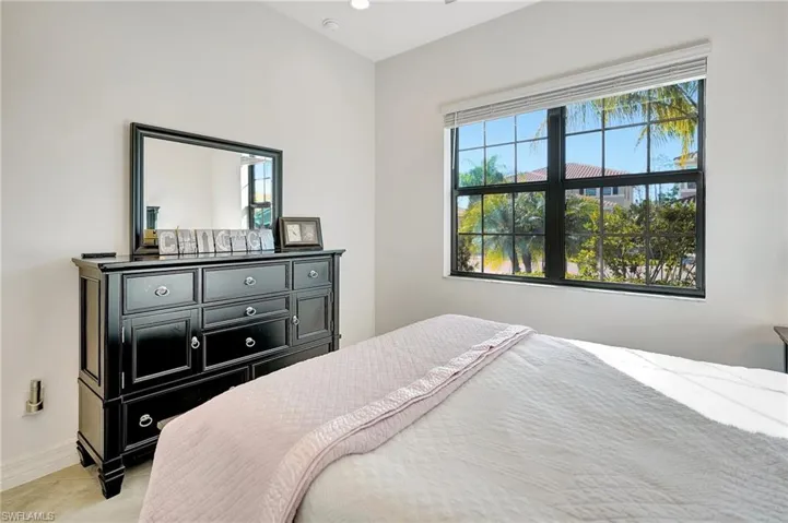 Bedroom with baseboards and recessed lighting