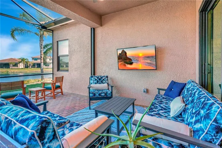 View of patio / terrace featuring a water view and outdoor lounge area