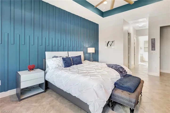 Tiled bedroom with baseboards