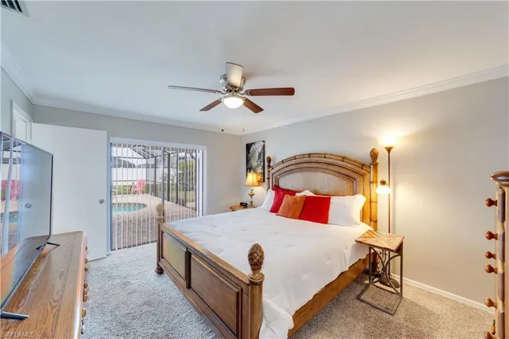 Primary bedroom with direct access to pool