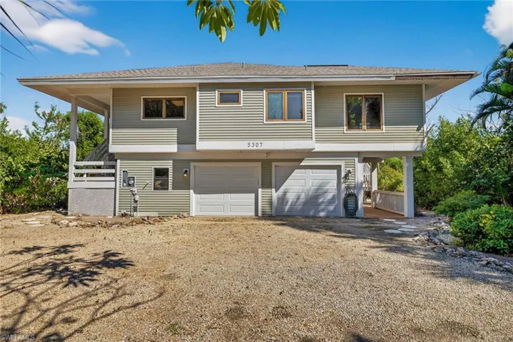 Elevated for peace of mind, complete with a brand-new roof built for island living that lasts.