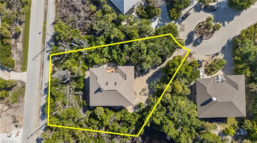 Peaceful privacy at the end of the cul-de-sac, embraced by natural Sanibel beauty