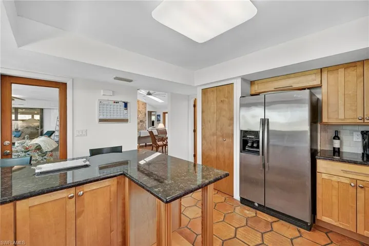 Bright, spacious with abundant storage, stainless-steel appliances, breakfast bar.