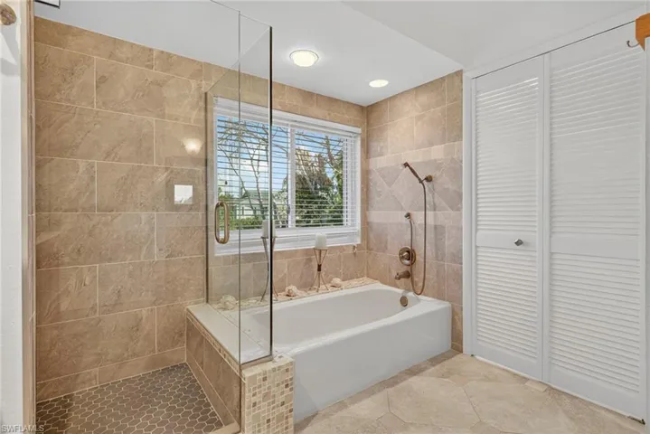 Your own escape with abundant natural light, spacious ensuite, and relaxing soaking tub