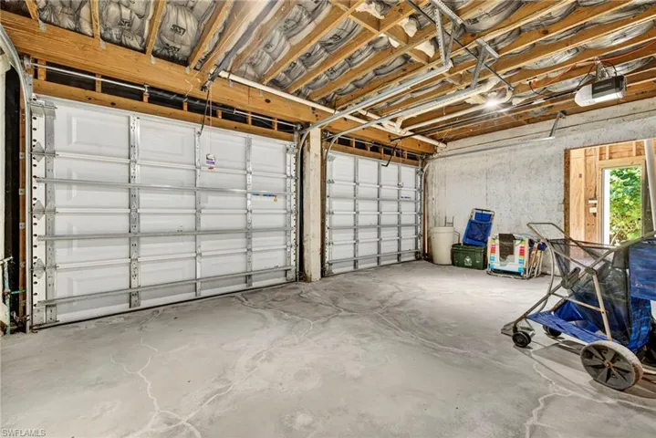 Large two car garage with lots of bonus room.
