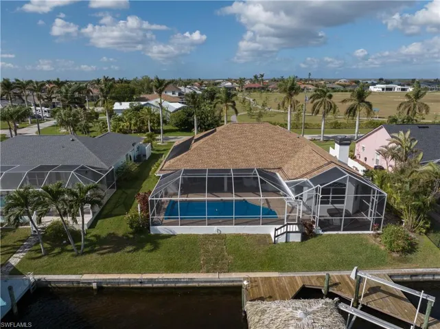 Bird's eye view featuring a water view and a residential view