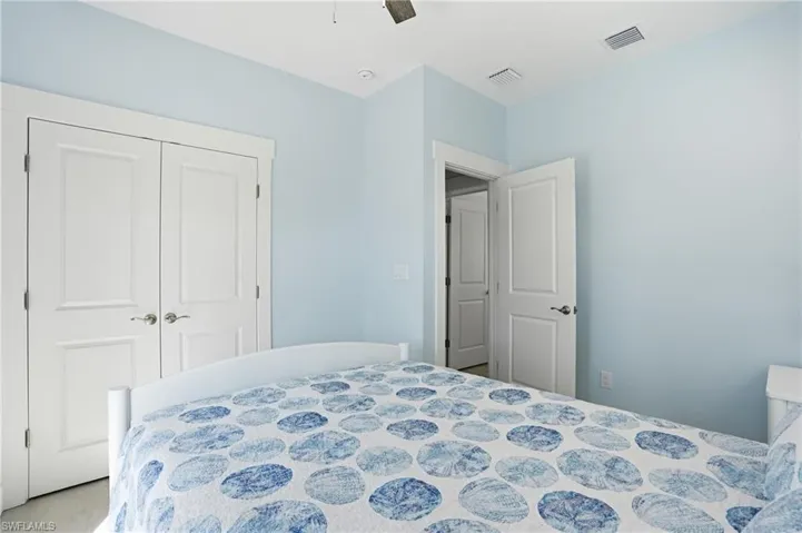 Interior room with light blue walls and white trim - Virtually Edited Image