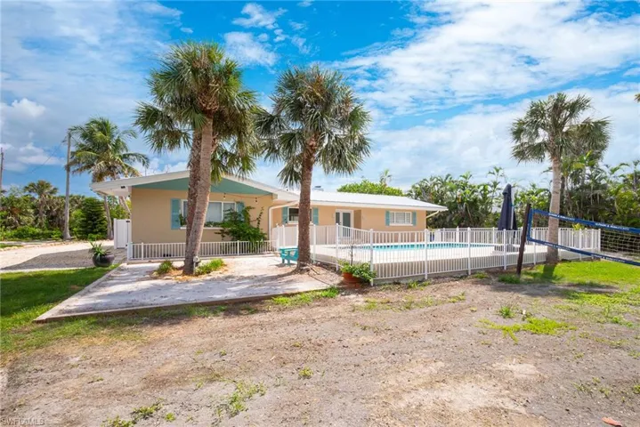 Rear view of property featuring a patio