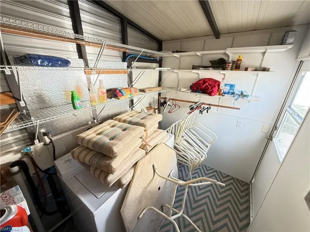 Storage area with washer / clothes dryer