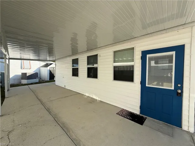 Doorway to property with a patio