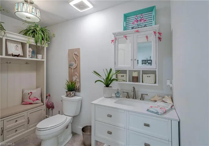 Bathroom with vanity and toilet