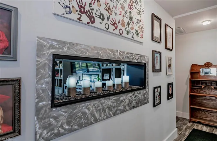 Detailed view of wood finished floors and baseboards