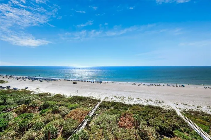 Dunnfoire #1002 has spectacular wide views of Marco Beach from an expansive balcony