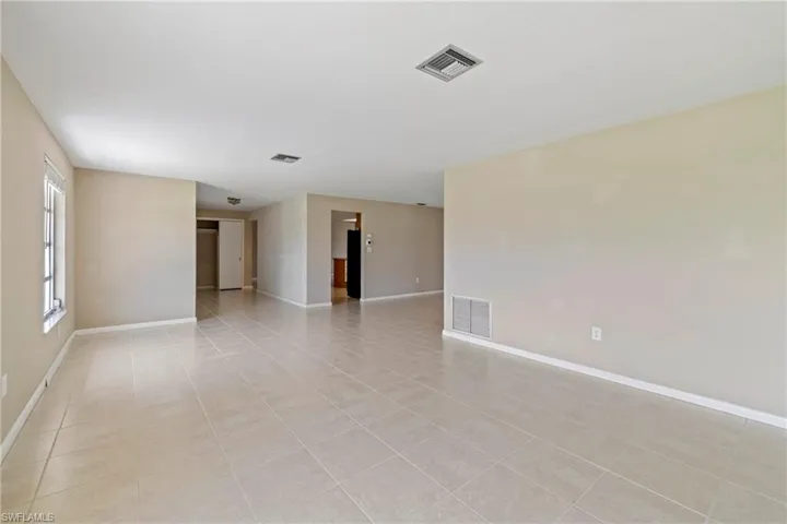 View of tiled spare room