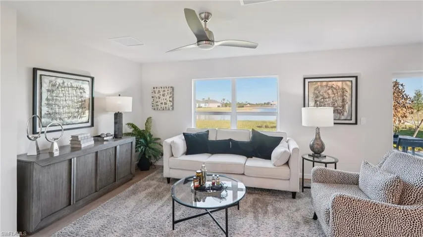 Living area with large windows providing ample natural light