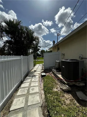 View of yard featuring central air condition unit