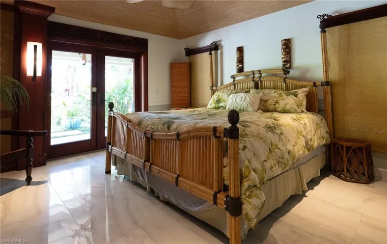 Bedroom featuring access to exterior and french doors