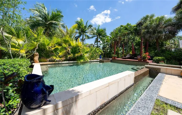 View of swimming pool with an infinity pool