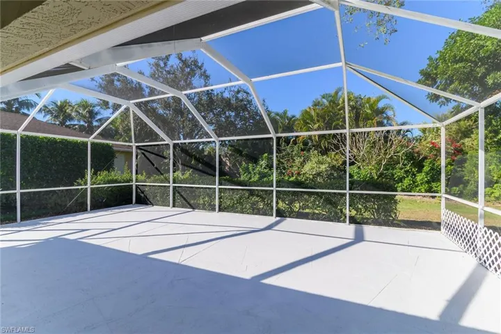 View of patio / terrace featuring glass enclosure and a sunroom