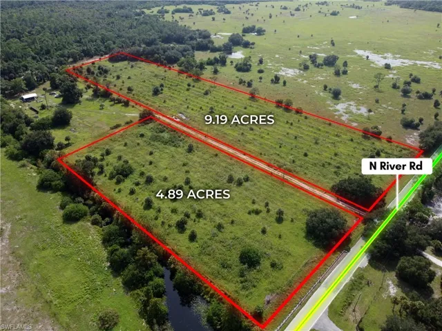 Birds eye view of property with a rural view